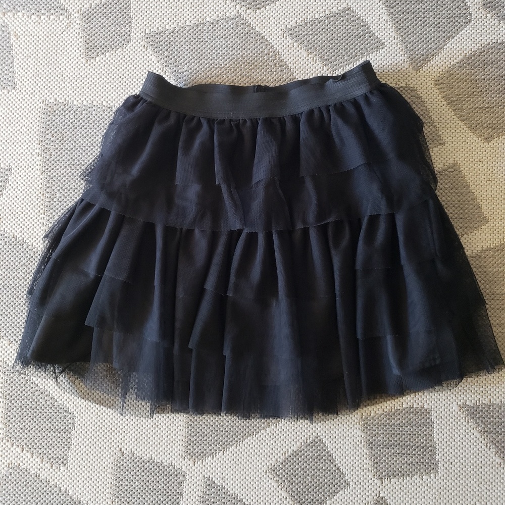 Ruffled black mini skirt